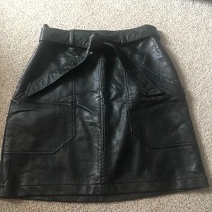 Black leather mini skirt